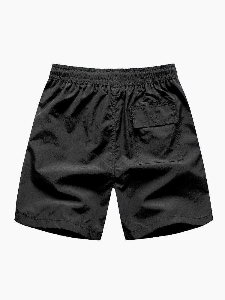 Overhemd en zwemshort met geometrische kleurblokken en knoopsluiting