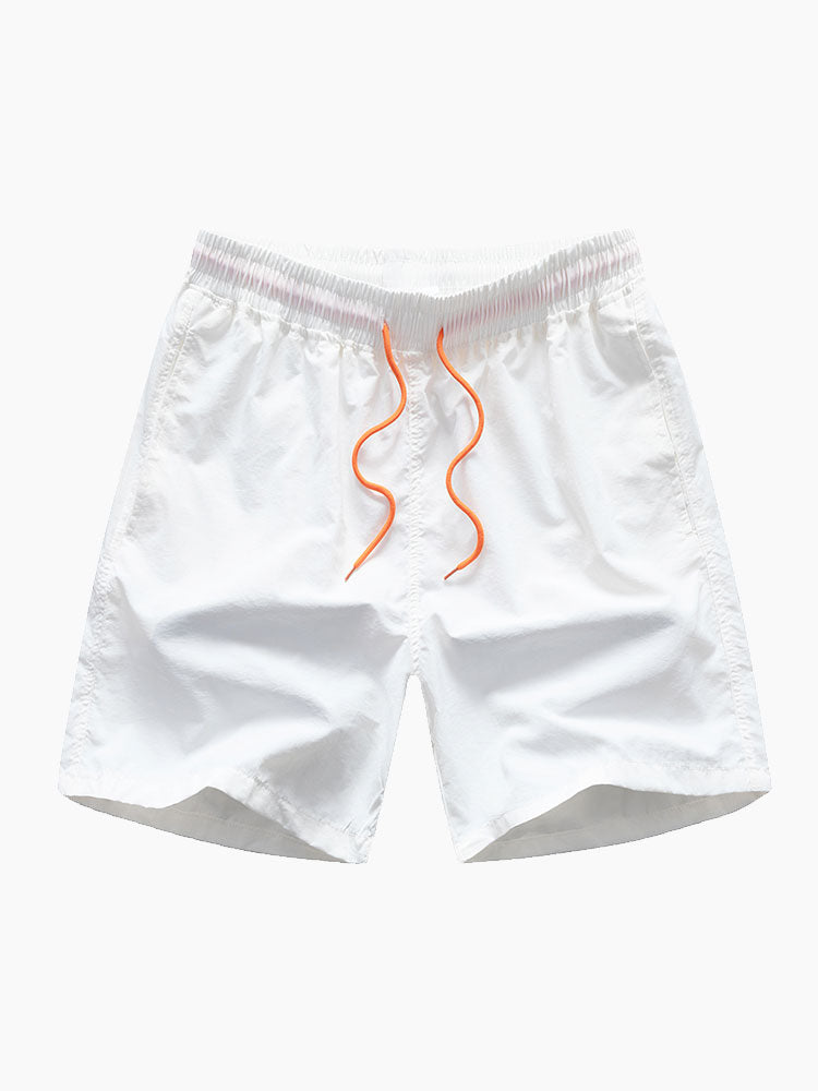 Overhemd en zwemshort met geometrische kleurblokken en knoopsluiting